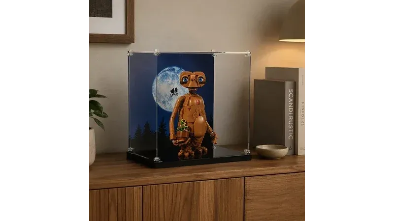 LEGO E.T. 21370 model displayed inside a clear acrylic display case