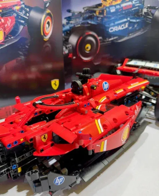 Close-up of the LEGO Ferrari F1 Racer’s V6 engine with moving pistons, highlighting the set’s interactive features.