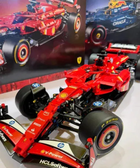 LEGO Ferrari F1 Racer 42207 model displayed in a custom acrylic case, showcasing its vibrant red livery and intricate mechanical details.